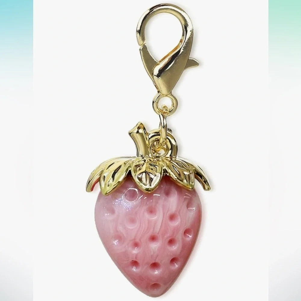 Pink strawberry purse charm with gold hardware
